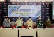 Plh Walikota Jadi Penerima Pertama Vaksinasi Covid-19 di Dumai