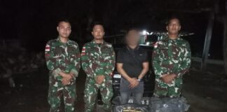 Satgas Pamtas RI-Malaysia Yonarmed 11 Kostrad Gagalkan Penyelundupan 240 Kaleng Miras Ilegal